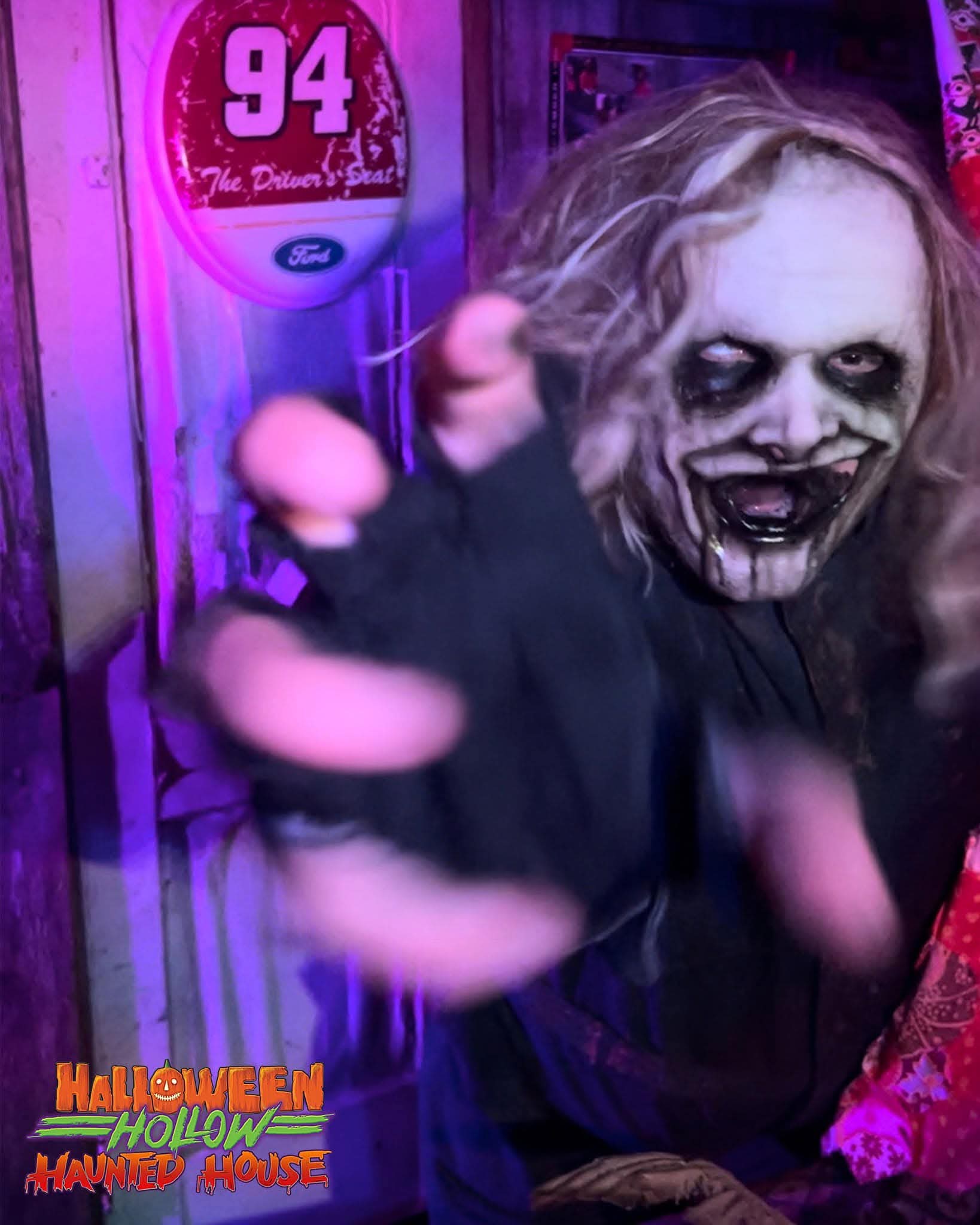 Actors posing on a haunted porch scene